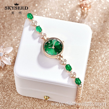 SKYSEED emerald type mother-of-pearl watch